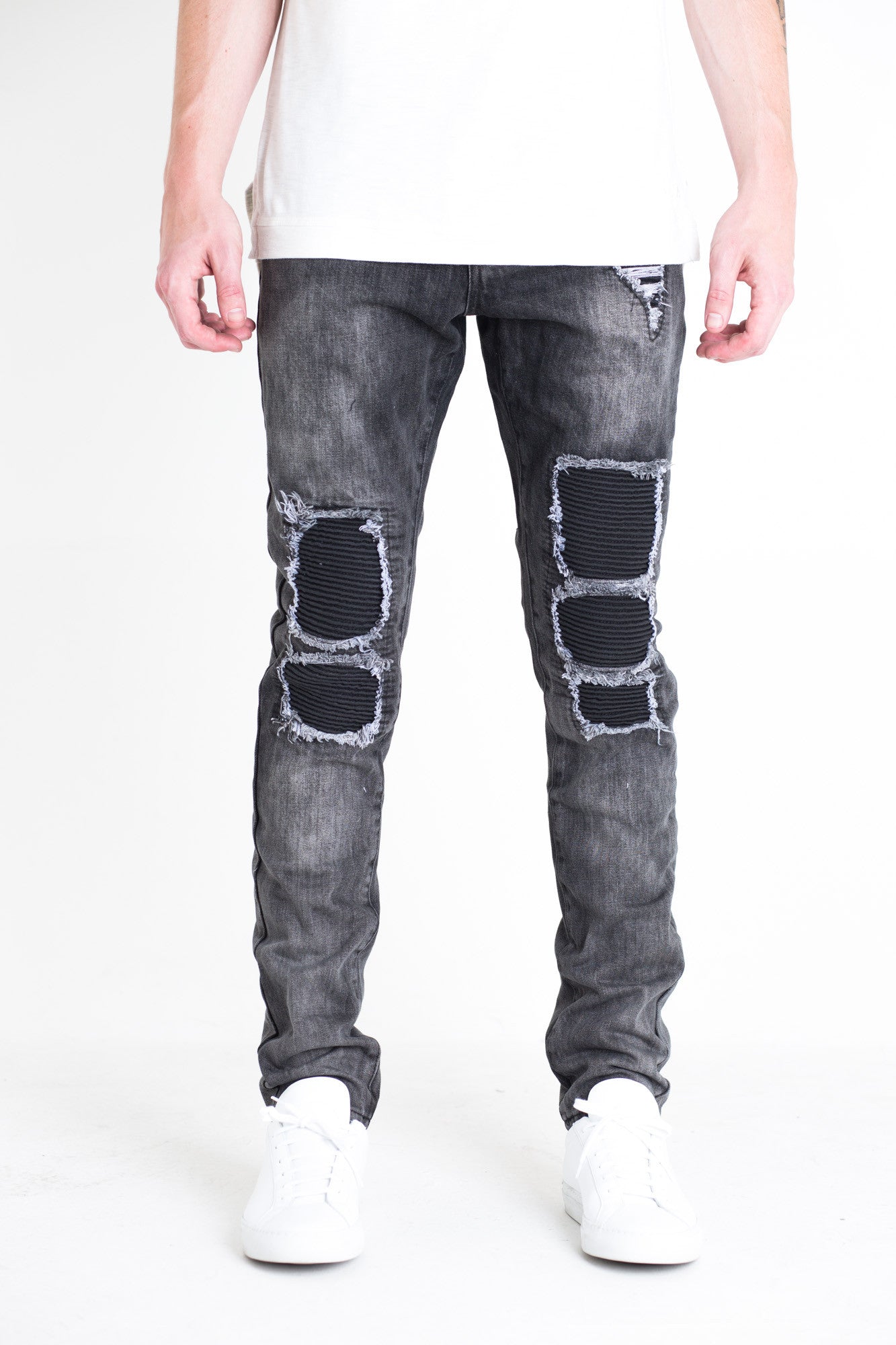 Ellis Ripped Denim | Embellish X Quincy Capsule Collection Charcoal washed denim Distressed patchwork with biker ribbing details 100% cotton Skinny fit 34" standard inseam