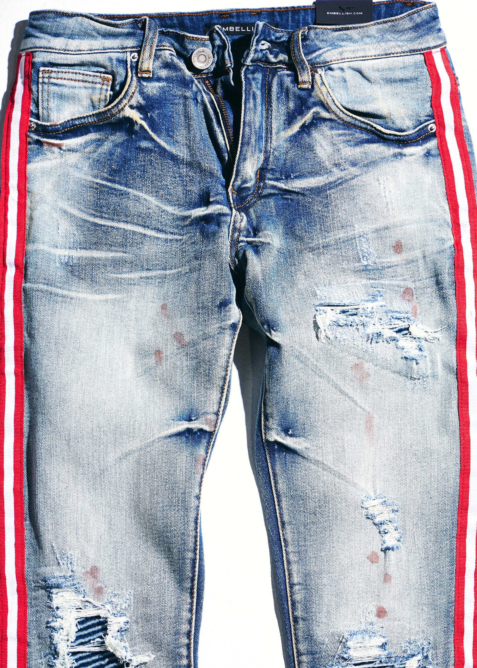 Blue jeans with 2025 red and white stripe